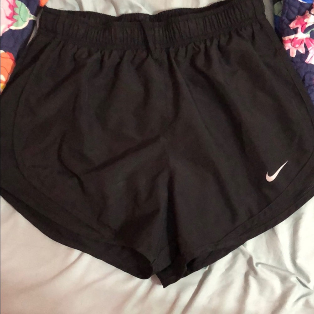 Black Nike running shorts